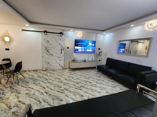A la foto es mostra l'objecte The Milton Apartment situat a la ciutat de Ikeja.