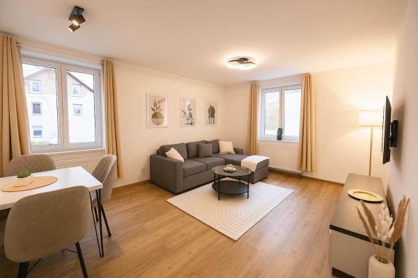 Na zdjęciu widoczny jest obiekt Allgäu Suites - Innenstadt, Schlafzimmer, Küche, Parkplatz möglich, Dachterrasse położony w mieście Breiten.