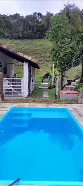 Na fotografii je vidět objekt Sítio- Da Roça- Piscina- Super Pet Friendly nacházející se ve městě Imbau.