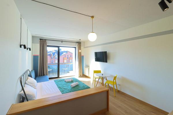 På billedet ses objektet Spacious and Stylish Apartment In New Gudauri beliggende i byen Gudauri.