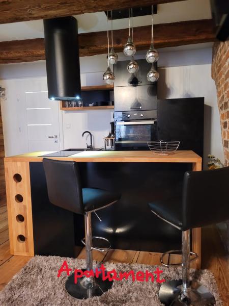 Na zdjęciu widoczny jest obiekt Old Town Mostowa - I piętro - Apartament lub pokój położony w mieście Toruń.