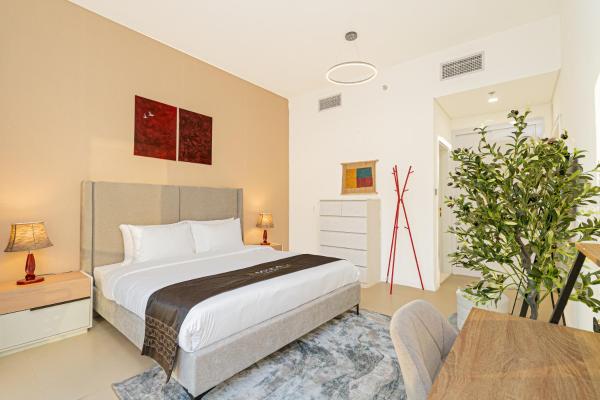 På billedet ses objektet Escape24 Chic 1BR in Al Furjan near Metro beliggende i byen Dubai.