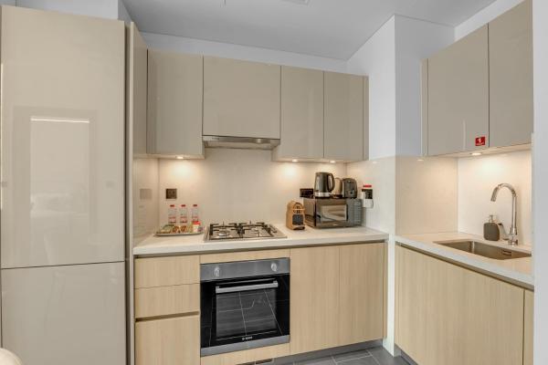 Foto 7: Waves - Modern & Cozy 1BR Apt Close to Down Town Dubai