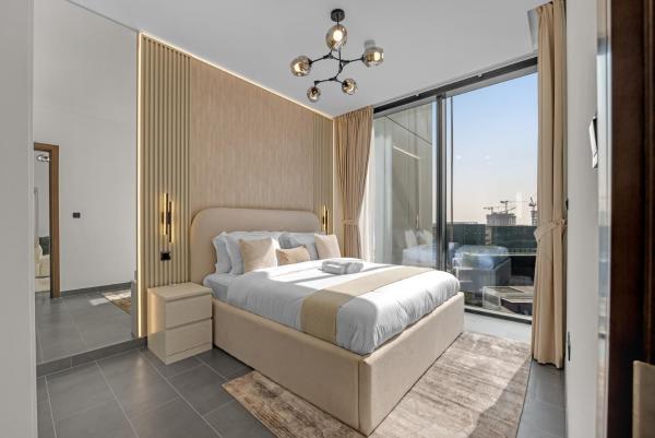 Foto 2: Waves - Modern & Cozy 1BR Apt Close to Down Town Dubai