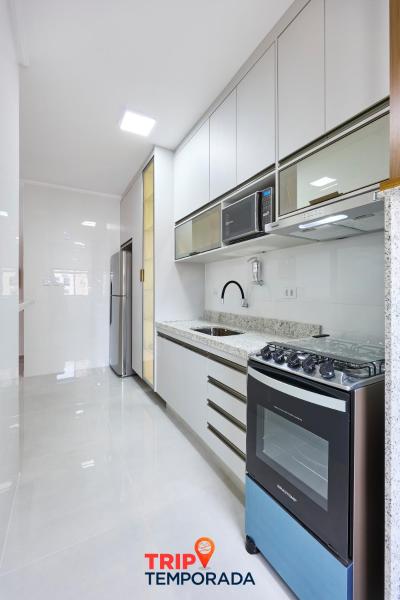 A la foto es mostra l'objecte Apartamento espaçoso com ar condicionado e Wi-fi, a 100 metros da praia - Edifício Estoril situat a la ciutat de Ubatuba.