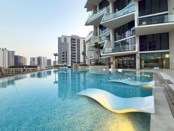 På billedet ses objektet Private Pool - Amazing 1BR Apartment in JVC beliggende i byen Dubai.