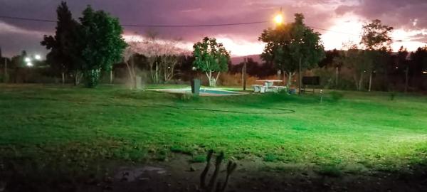 Plumas verde, casa campo
