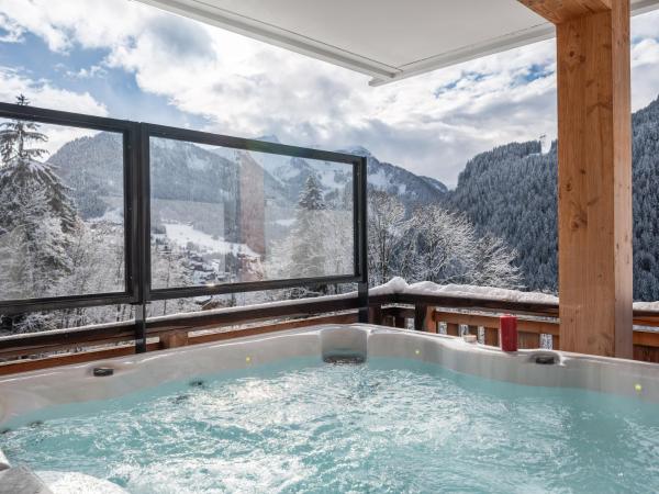 The photo shows the L'O Rouge - Apt A102 - BO Immobilier- Châtel Multipass 2026 Activités en Été offert par votre hôte located in the city of Châtel.