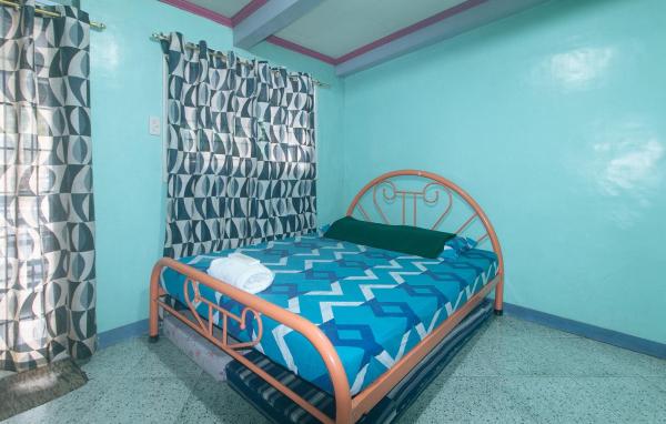 Na fotografii je vidět objekt RedDoorz Hostel at MRC Residences Baguio nacházející se ve městě Baguio.