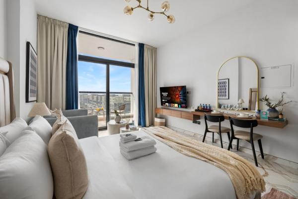 A la foto es mostra l'objecte Cozy Studio With Pool, Gym and Outdoor Cinema situat a la ciutat de Dubai.