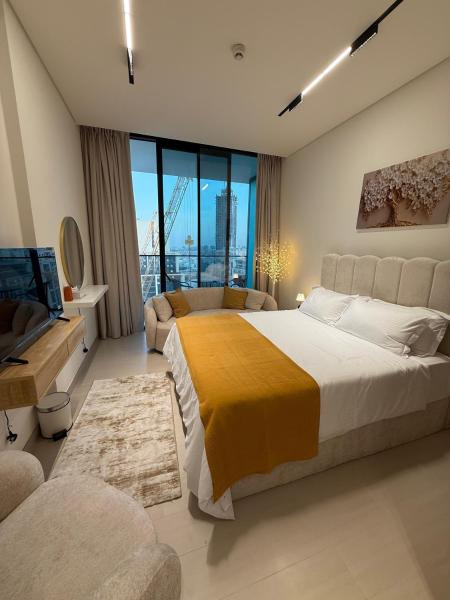 A la foto es mostra l'objecte Modern Studio Apartment In JVC situat a la ciutat de Dubai.