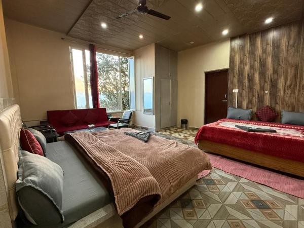 På billedet ses objektet Hotel Sunrise Inn & Restaurant, Kanatal beliggende i byen Chamba.