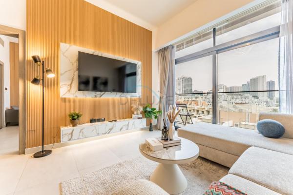 A la foto es mostra l'objecte Community View 1BR, Just 15minutes to Miracle Garden - Oxford Boulevard, Jumeirah Village Circle by Deluxe Holiday Homes situat a la ciutat de Dubai.