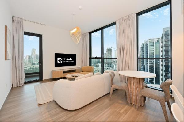 A la foto es mostra l'objecte Chic 1BR in JVC Belgravia Heights 2 Balcony, Pool & Gym situat a la ciutat de Dubai.