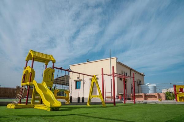 Op de foto is het object Eco Paradise UAQ 2BHK Studio Near UAQ Zoo te zien, gelegen in de stad Umm al-Qaiwain.