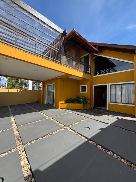 På billedet ses objektet Casa completa para até 8 pessoas - Praia do Campeche beliggende i byen Florianópolis.