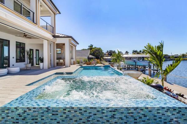 Luxe Waterfront Escape With Heated Pool, Spa & Gulf Access - Villa Solara - Roelens - Cape Coral, FL