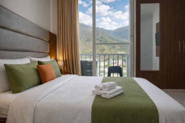 På billedet ses objektet Ima Ganga Hotel - Aesthetic, Quite Mountain View Rooms In Upper Tapovan with netflix, free airport pickup for 7 or more nights booking beliggende i byen Rishikesh.