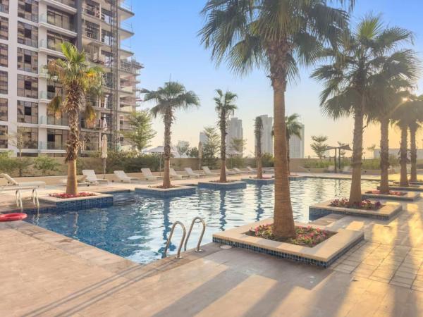På billedet ses objektet FIRST CLASS Studio Cozy Luxe Retreat beliggende i byen Dubai.