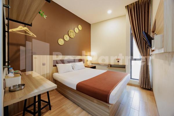写真にはBahom市にあるHotel Gandamanah Mitra RedDoorzが写っています。
