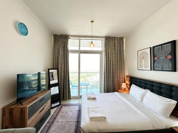 A la foto es mostra l'objecte Cozy Studio Retreat in Damac Hills situat a la ciutat de Dubai.