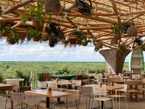 A la foto es mostra l'objecte Siente Tulum Hotel & Cenote Club situat a la ciutat de Tankah.