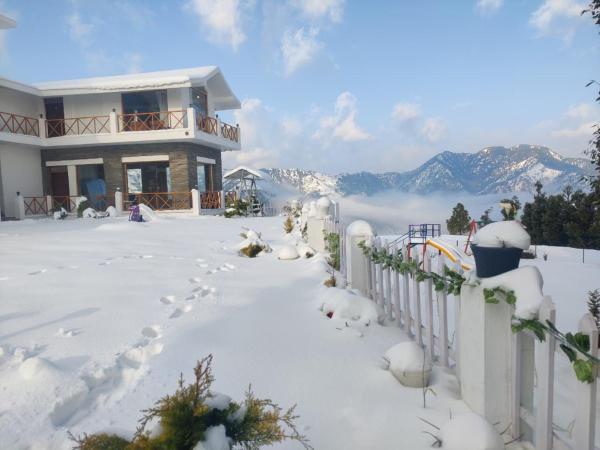 A la foto es mostra l'objecte Maatidera Resort Kanatal The Boutique stay in the Lap of Himalayas situat a la ciutat de Kanatal.