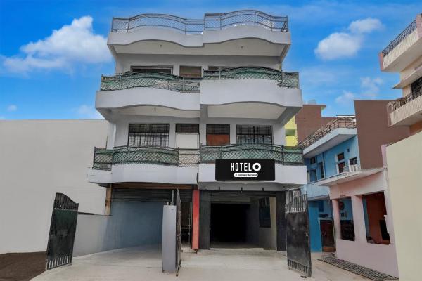 Nella foto è visibile l'oggetto Super Hotel O Daraganj Ghat Prayagraj Formerly Purohit Inn situato nella città di Colonelganj.