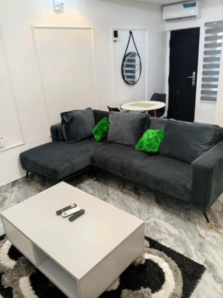 A la foto es mostra l'objecte Grace court apartment situat a la ciutat de Mama.