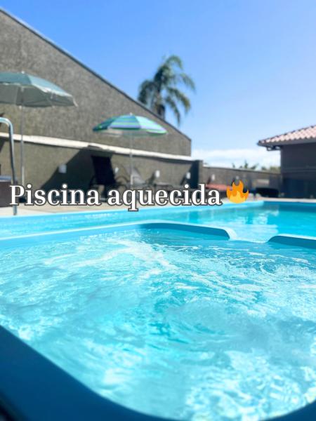 Na fotografii je vidět objekt Casa Sol da Manhã - Piscina aquecida com hidromassagem - 300m da praia nacházející se ve městě Brejatuba.