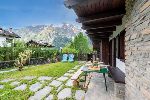 På bildet vises objektet Charming Apart with Garden in Courmayeur - Happy Rentals som ligger i byen Verrand.