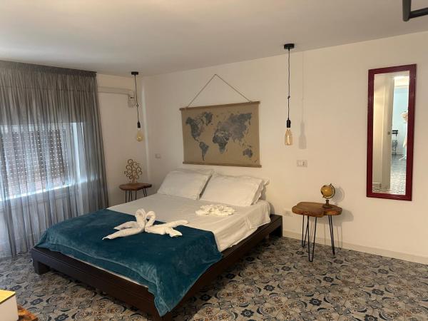 Na foto é possível ver o objeto Duba Holiday House localizado na cidade de Palermo.