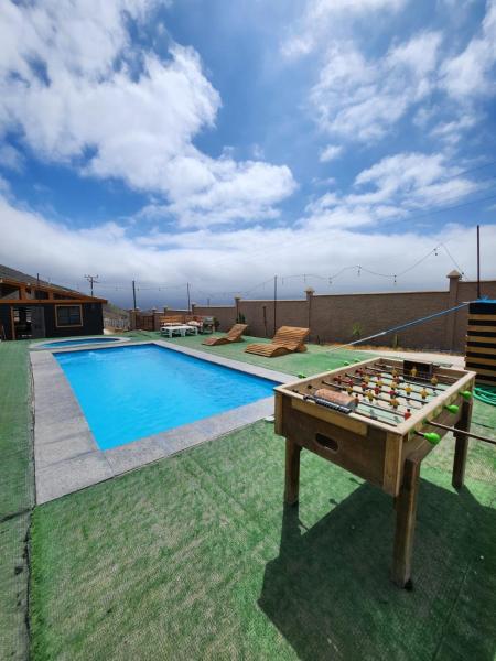 På bildet vises objektet Cabaña 2 con tinaja y piscina privada som ligger i byen Las Rojas.