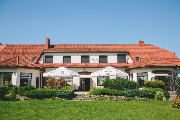 Na fotografii je vidět objekt Hotel Zodiak nacházející se ve městě Sucha.