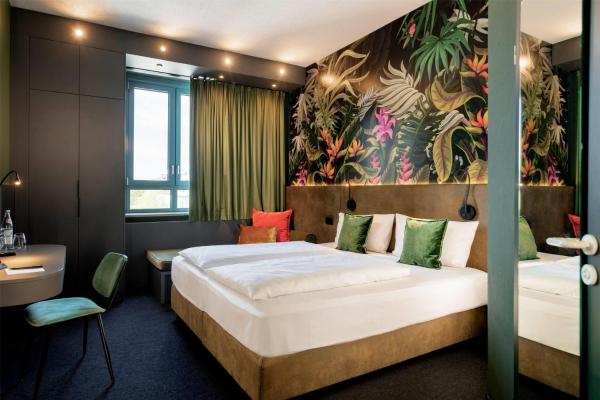 På billedet ses objektet Rugs Hotel Augsburg, Trademark Collection by Wyndham beliggende i byen Augsburg.