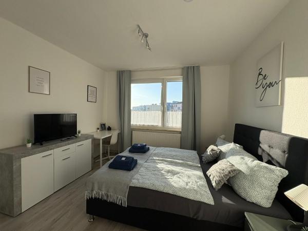 Foto 1: Quartier 7 - zentral gelegene Ferienwohnung mit Stadtblick