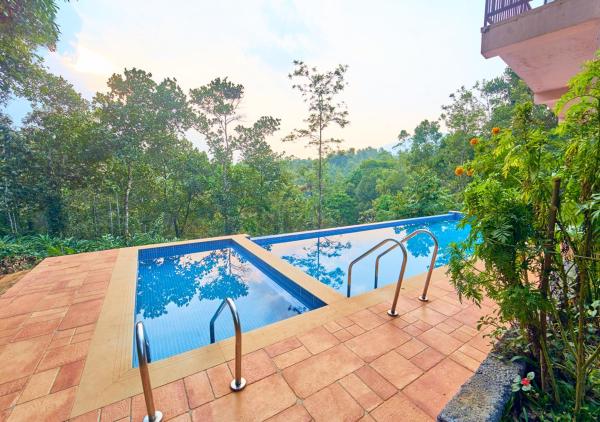 Nella foto è visibile l'oggetto Gardenia Resort Munnar by VOYE HOMES situato nella città di Munnar.