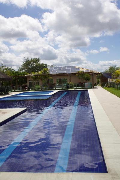 Na fotografii je vidět objekt APT Completo - Suíte - 2 Ar-condicionados, Wi-FI, Piscina, garagem, portaria - aconchegante nacházející se ve městě Toritama.