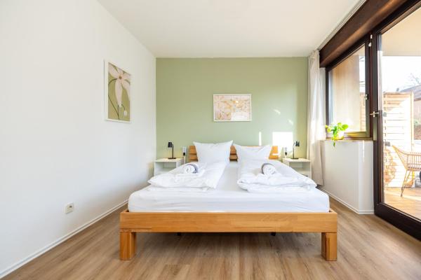 A la foto es mostra l'objecte Nette Apartments mit Terrasse situat a la ciutat de Höchberg.