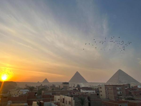 A la foto es mostra l'objecte Zein Pyramids View - Guest House situat a la ciutat de El Caire.