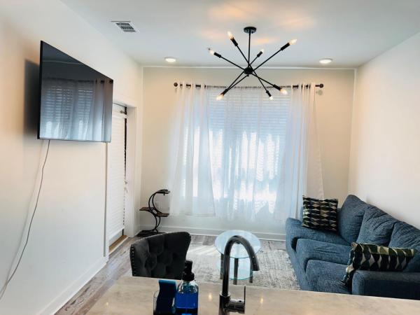The photo shows the Downtown Atlanta Home Away From Home located in the city of Atlanta.