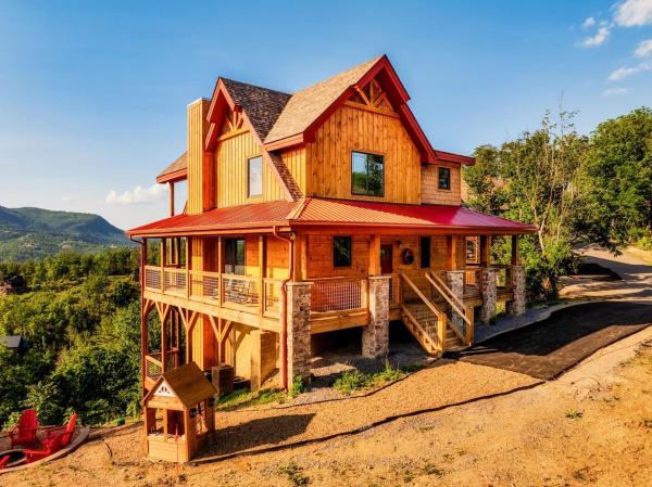 A la foto es mostra l'objecte UltEscape 4 Pvt BDRM5BA-VIEWS-Firepit-Theater situat a la ciutat de Sevierville.