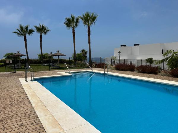 A la foto es mostra l'objecte Chulera Beach townhouse sea views situat a la ciutat de Manilva.
