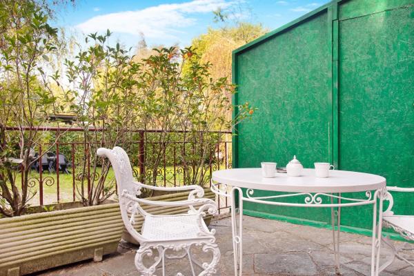 A la foto es mostra l'objecte Suite in villa con parco situat a la ciutat de Varese.