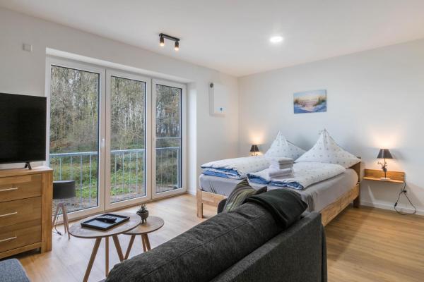 Op de foto is het object Hodderup Wohnung 10 te zien, gelegen in de stad Husby.