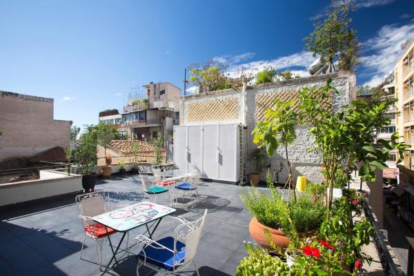 A la foto es mostra l'objecte Lovely two-bedroom apartment with roof garden! EP7 situat a la ciutat de Atenes.