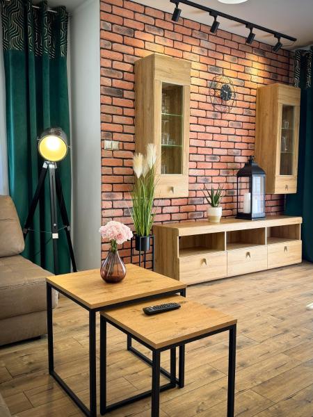 The photo shows the Apartament Piastowska located in the city of Ostróda.