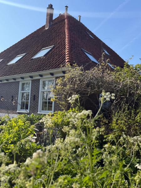 На фото показан объект B&B De Pauw - Country Home Cooking, расположенный в городе Spijkerboor.