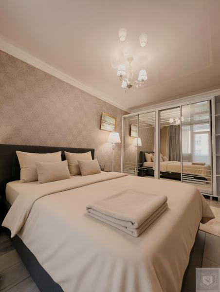 The photo shows the RentHouse Apartments Premium Living located in the city of Codru.