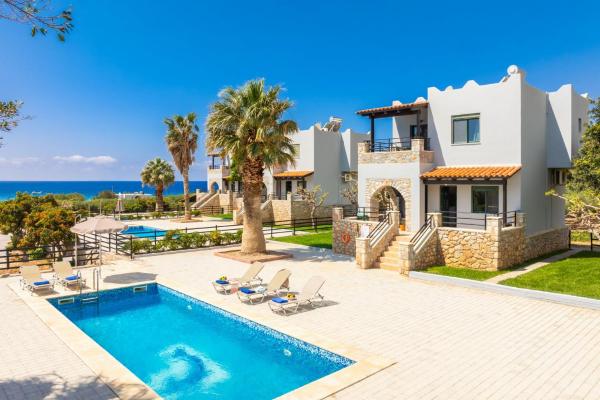 A la foto es mostra l'objecte Spiros Beach Villa situat a la ciutat de Áyios Yeóryios.